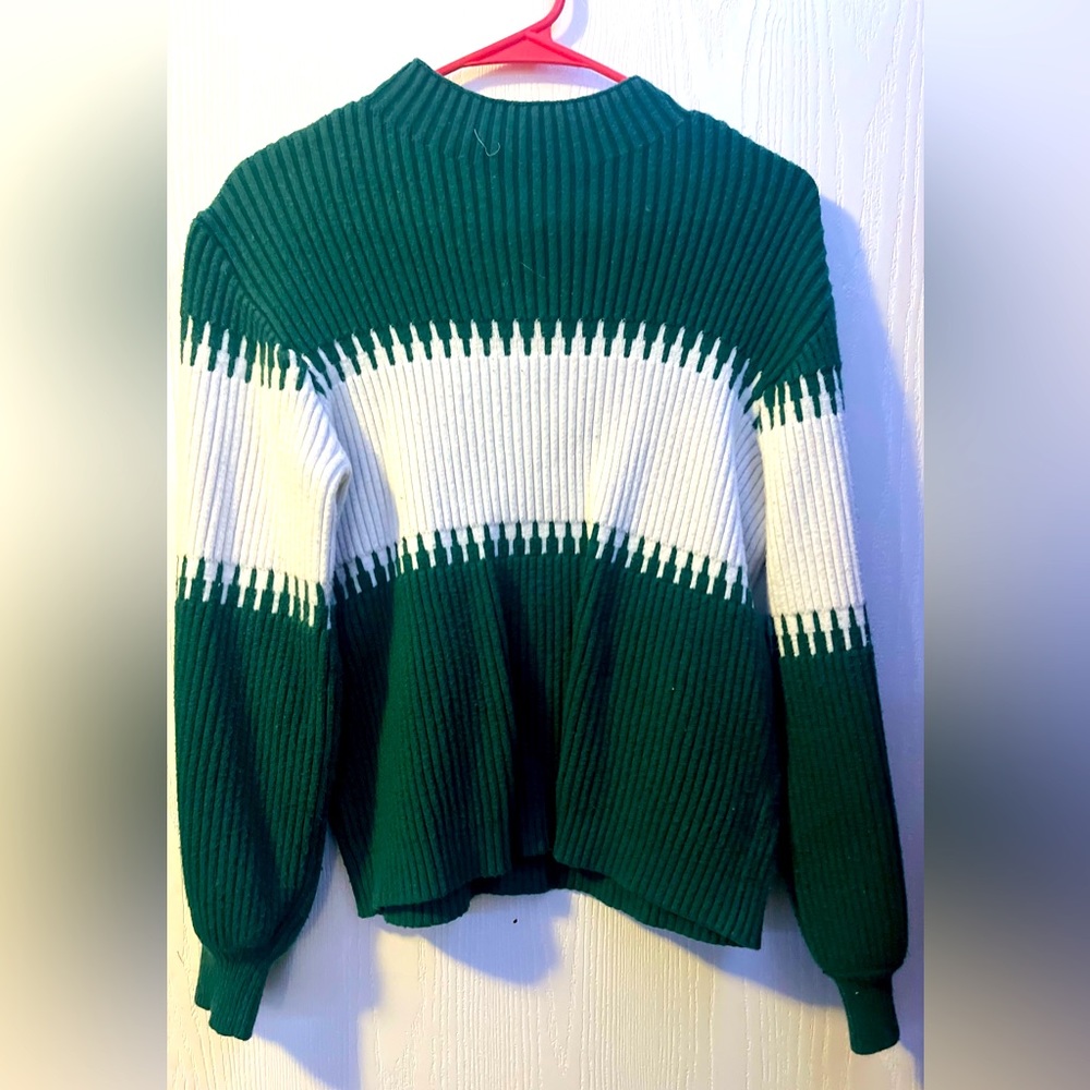 Green and white sweater